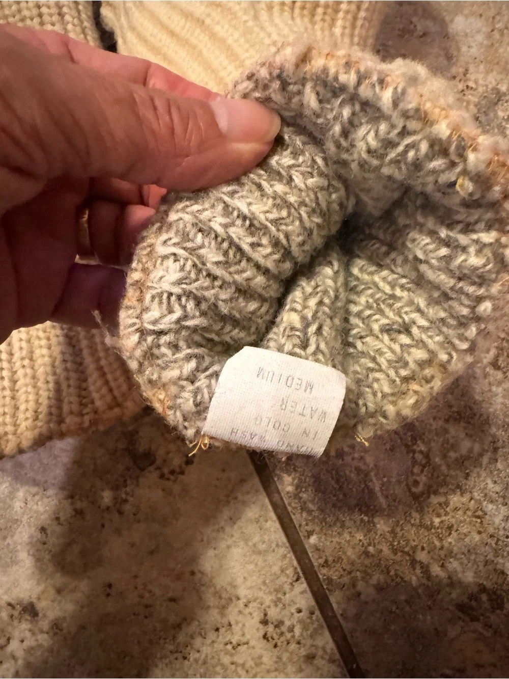 Adult pair of vintage cream-colored ribbed knit 100% wool mittens size medium